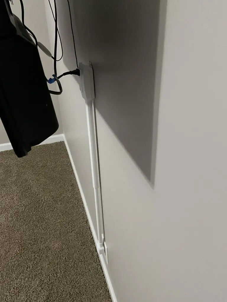 Socketify behind TV with cables managed